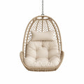 Silla colgante de ratán sintético beige con cojín para exterior
